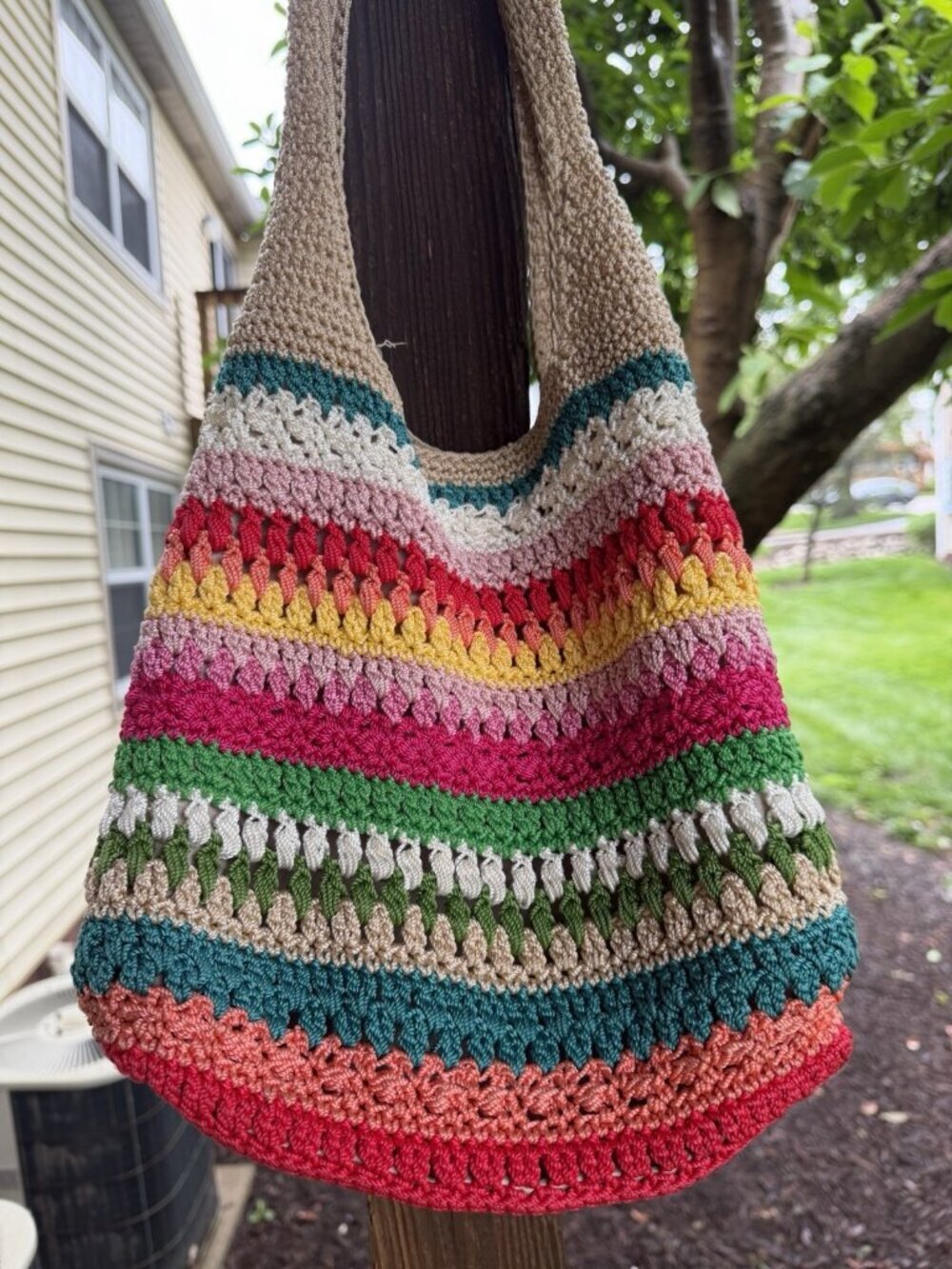 The Sak Originals rainbowcore striped crochet bucket bag hippie bohemian